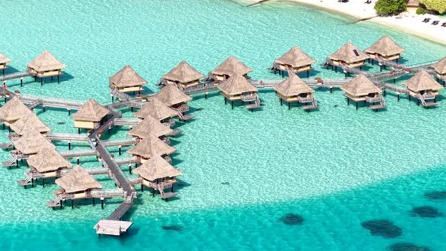 Bora Bora Island, French Polynesia. Drone Shot of Luxury Bungalows Above Turquoise Water