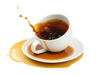 Coffee spills from a tipped white cup