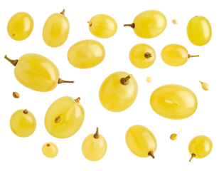 Close-up view of many pale yellow grapes, various sizes, some showing stems and seeds