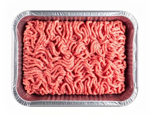 A rectangular aluminum tray filled with light pink ground meat, showing a textured, swirled pattern