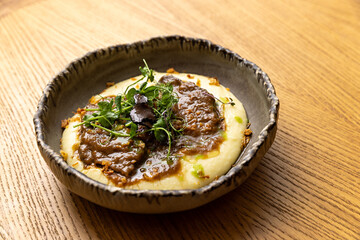 Tender Wagyu beef cheeks with a creamy truffle sauce and mashed potato