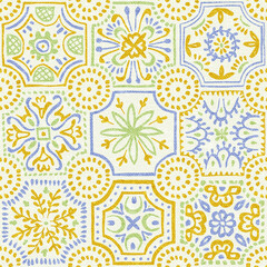 Bright seamless tile pattern. Hand-drawn style with yellow, green, and blue motifs. Inspired by Mediterranean ceramics. Vector illustration.
