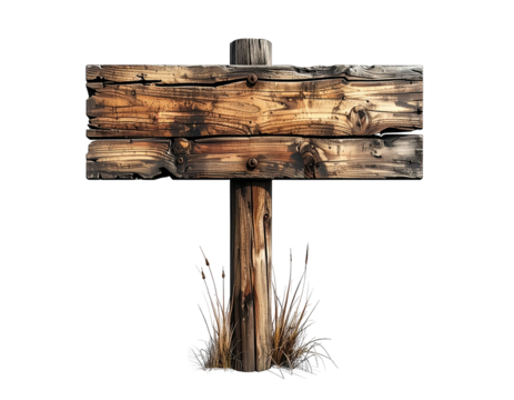Aged wooden signpost with weathered planks, mounted on a rustic post and surrounded by dried grasses