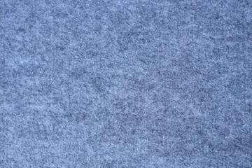 Textured grey geotextile carpet background