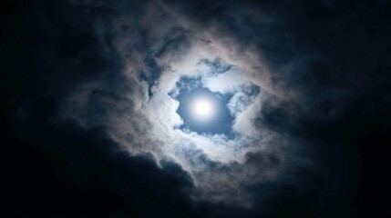 Obraz premium A moonlit sky framed by nebulous clouds, whispering mysteries of Samhain and the Dance of the Spirits