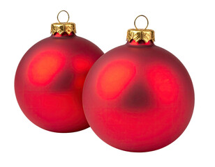 Two red Christmas ornaments, glossy, spherical, with gold-toned hanging loops, against a black background