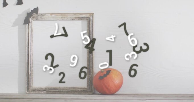 Numbers flying in from left swirling around pumpkin and frame while looping to showcase animation