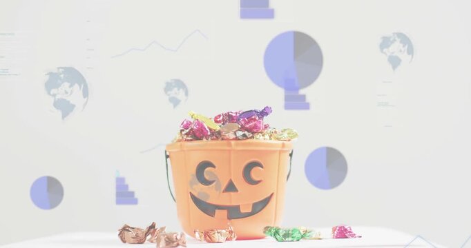 Infographics emerging behind pumpkin candy bucket, fading after data peak, highlighting bucket