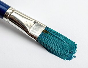 Teal paintbrush stroke on white paper