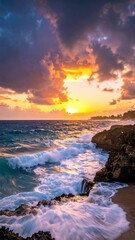 Dramatic sunset over ocean waves