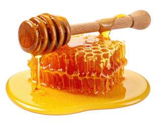 Honeycomb with drizzled honey and wooden dipper