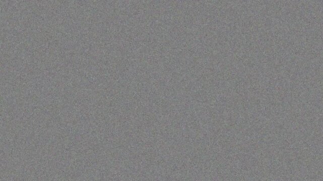 Realistic, subtle gray film grain texture. Seamless loop for adding a cinematic, vintage, or analog look to footage. Use with overlay or soft light blend modes for authentic effect