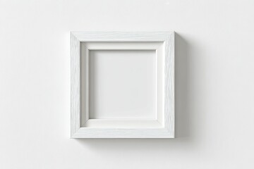 Empty white wooden picture frame on a white background