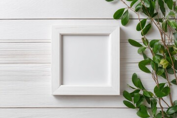 White frame on white wooden planks, with greenery