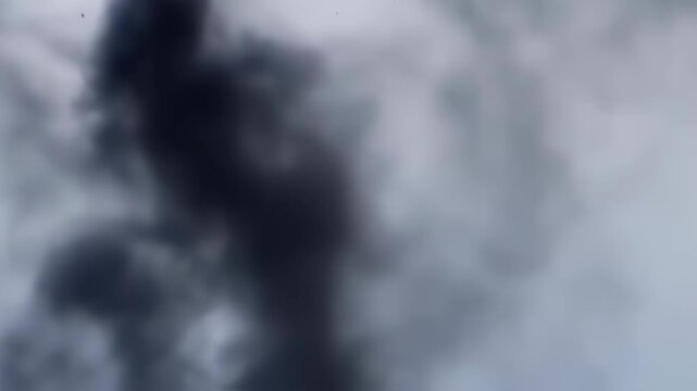 Energetic Bursts of Flame and Smoke Expanding Dynamically on Light Background