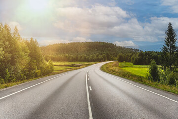 Winding road through the scenic landscape of Finland