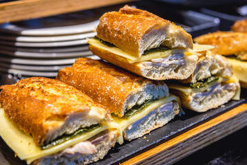 Traditional sandwiches displayed on the counter of pinchos bar in San Sebastian city in northern Spain
