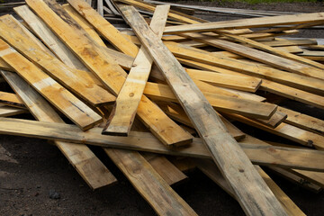 A Pile of Discarded Wooden Planks