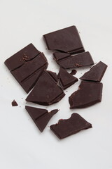 dark chocolate bar on white background 