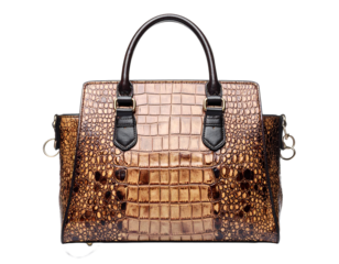 Brown crocodile leather handbag isolated on white, symbolizing affluence and exotic style.