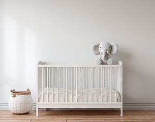 Simple white nursery with crib and elephant toy