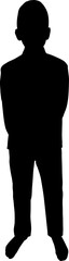 Silhouette of a young boy standing with hands back 