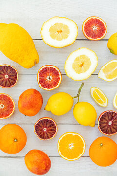 Assorted fresh citrus fruits including orange lemon blood orange and cedro in studio