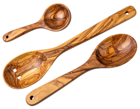 Three wooden kitchen utensils.  A ladle, slotted spoon, and spoon,  with natural wood grain, angled in a grouping - Powered by Adobe