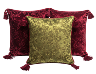 Two burgundy and gold patterned cushions with tassels