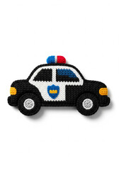 Fototapeta premium Charming handmade knitted police car toy with black and white design, vibrant red and blue roof lights, suitable for children's imaginative play or unique home decor