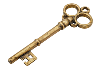 An antique brass key with intricate details, showcased against a stark black background. The gold key exudes vintage charm, hinting at untold stories.