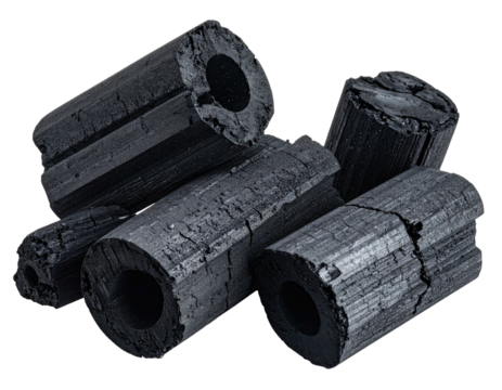 Dark gray charcoal briquettes, cylindrical, stacked