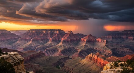 Naklejka premium Grand canyon at sunset with storm clouds