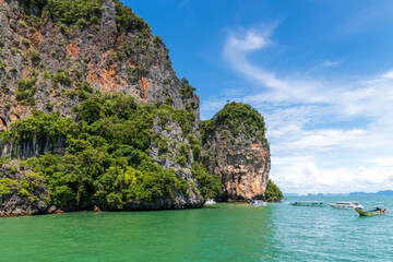 A Stunning and Beautiful Tropical Landscape Showcasing Majestic Cliffs and Crystal Clear Water