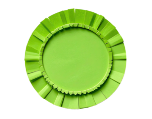 Circular lime green object with scalloped edge