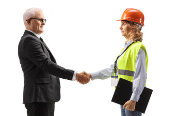 Businessman shaking hand with a female engineer