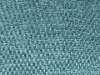 Blue and green texture cloth background. Fabric indigo color pattern, empty surface design