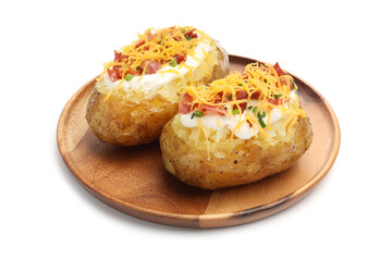 Tasty baked potatoes with sour cream, green onion, cheese and bacon isolated on white