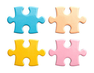 Obraz premium Four colorful puzzle pieces arranged in a grid