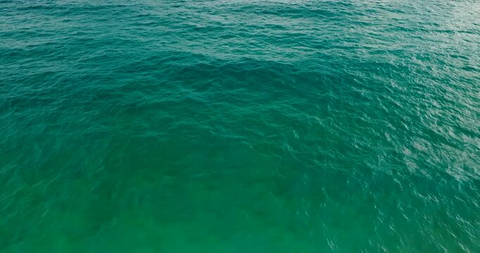 Aerial view scene top view sea water wave texture background. Water wave background concept High quality video 4k ProRes422