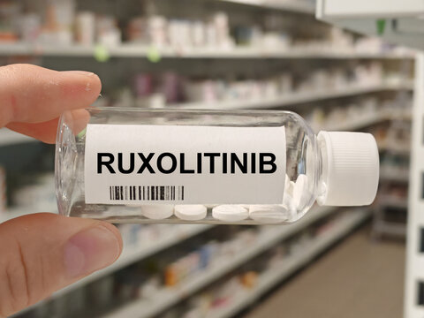 Box of RUXOLITINIB tablets on a hospital pharmacy table used to treat myelofibrosis and polycythemia vera a JAK inhibitor.