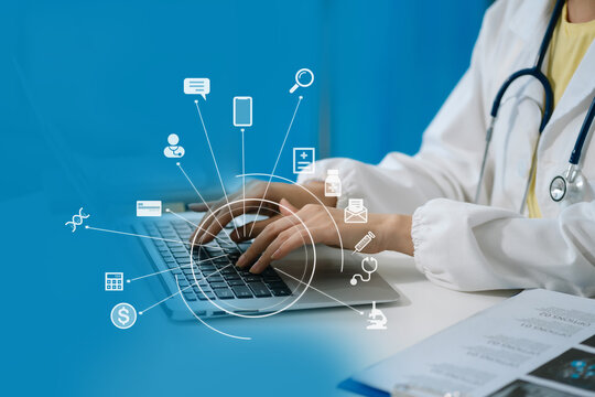 Medicine doctor hand working with modern digital smartphone and computer interface as medical network concept.