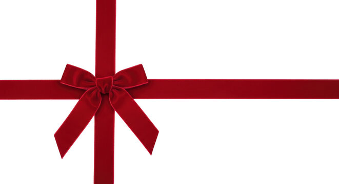 Isolated red velvet ribbon tied into a bow, festive decor for a gift or holiday project