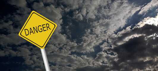 danger,caution,Hurricane Idalia warning sign against a powerful stormy background with copy space. Dirty and angled sign with cyclonic winds add to the drama.hurricane season sign on cloudy background