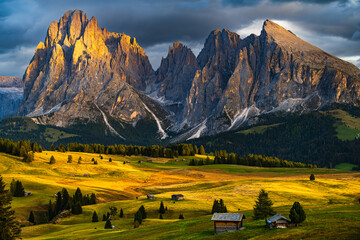 The UNESCO site Seiser Alm or Alpe di Siusi the Dolomite plateau and the largest high-elevation Alpine meadow  in Europe located in Italy's South Tyrol province in the Dolomites in autumn sunset.