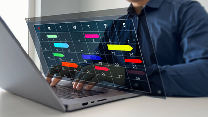 Managing a scheduled meeting.Businessman manages time to work efficiently and on time on all projects. Calendar work schedule, business plan concept.
