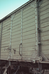 Close up of vintage wooden freight wagon door with metal frame