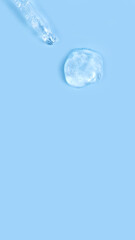 Drop of hydrating gel with bubbles and pipette, skincare serum concept, authentic layout, 9:16.