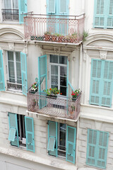 A summer day in Nice, the leisure of a traveler, the blazing sunlight, the beauty of a seaside retreat.