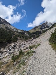 Rugged Mountain Trail in the Austrian Alps with Snow Dusted Peaks